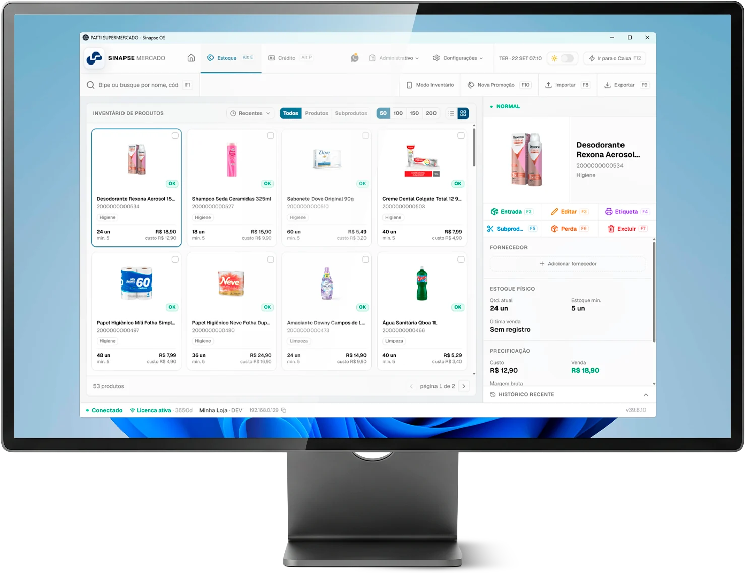Monitor com o inventário de produtos do Sinapse na tela